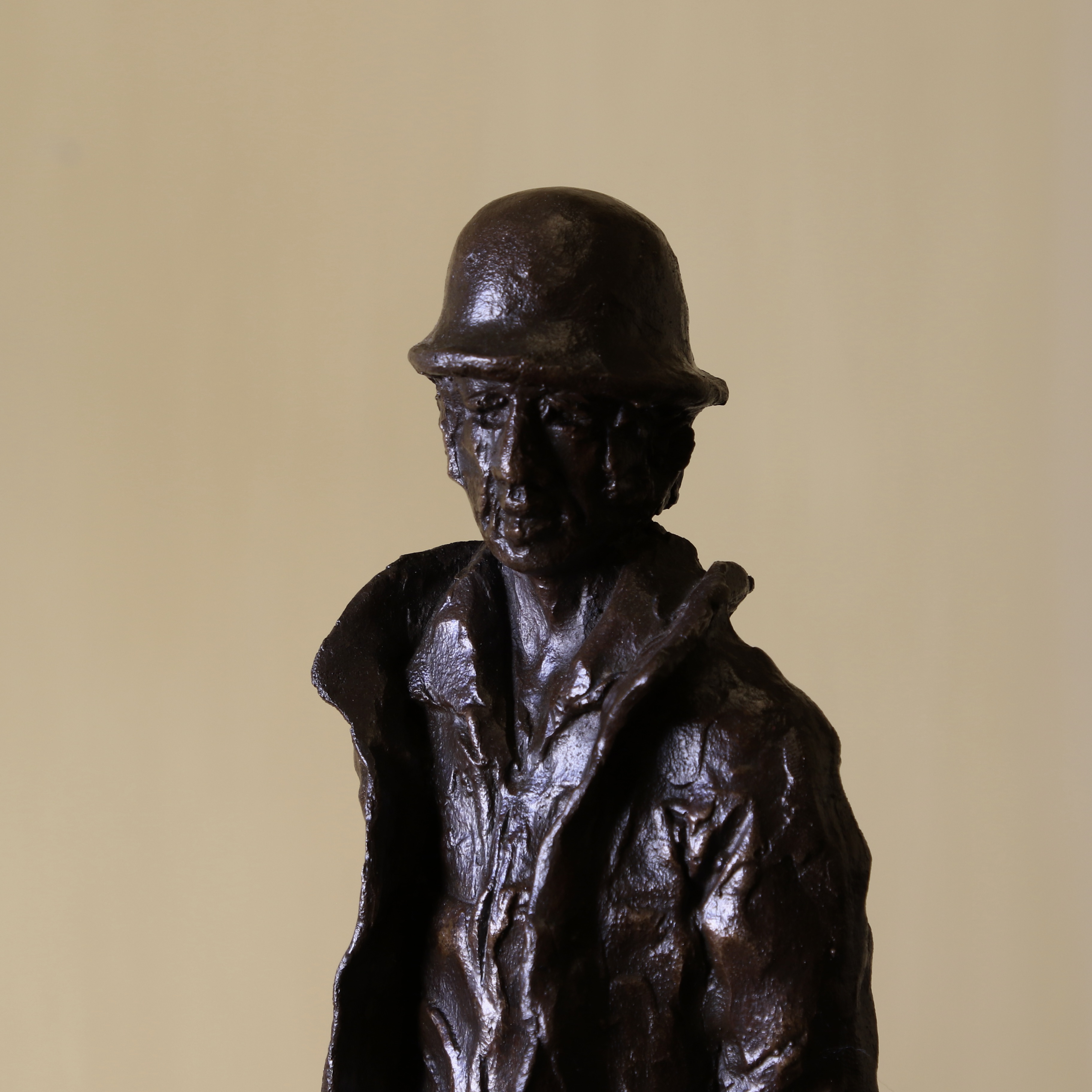 Bronze Man with Chainsaw